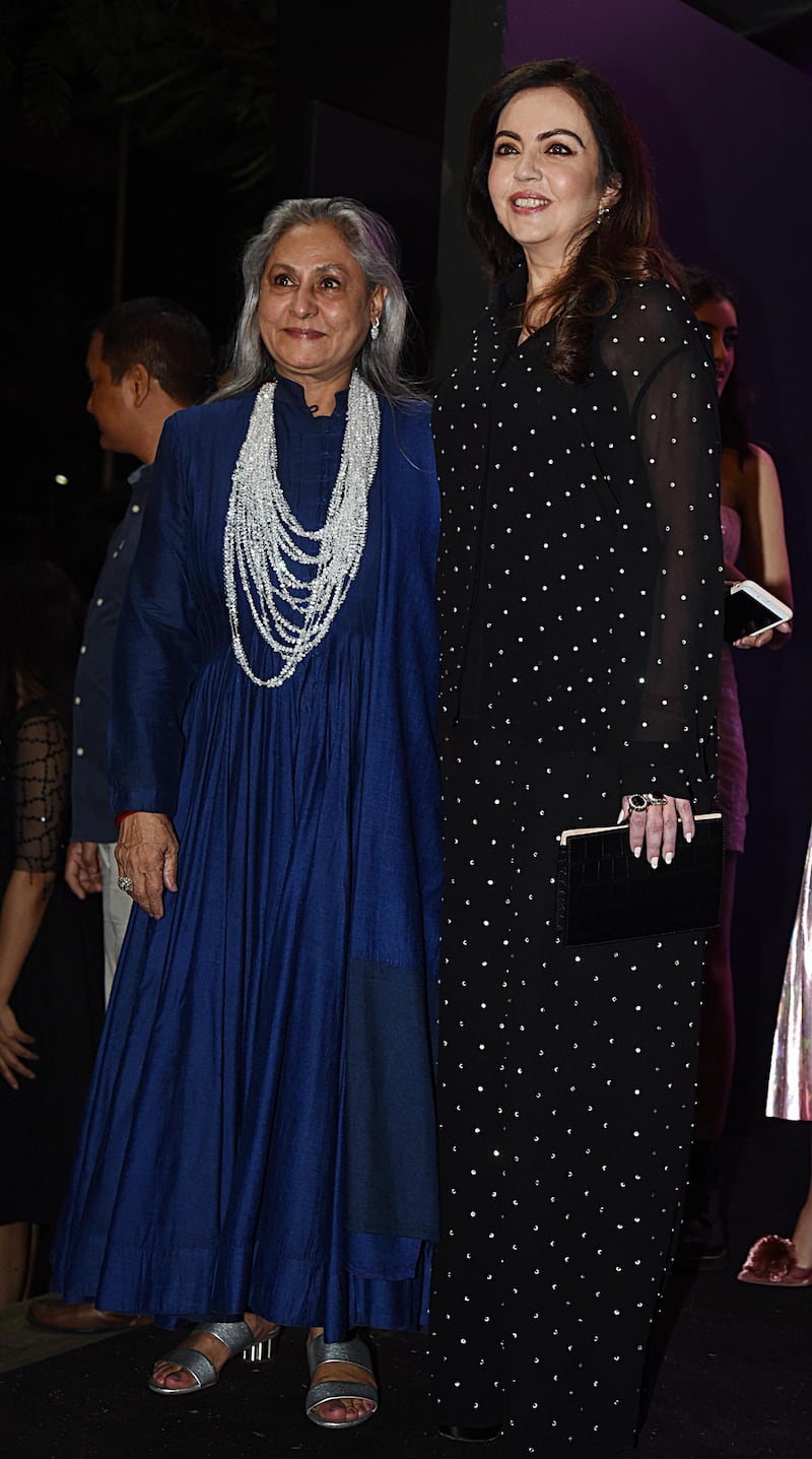 Proud mum Jaya Bachchan, left, with Nita Ambani. AFP