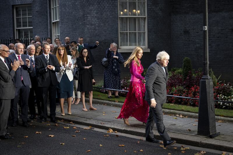 British prime minister Boris Johnson and his wife Carrie leave Downing Street on September 6. EPA