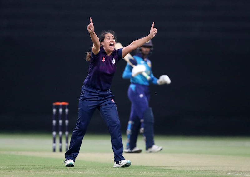 Scotland's Priyanaz Chatterji takes the wicket of Sri Lanka's Vishmi Gunaratne.