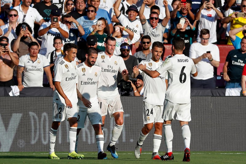 Real Madrid's Gareth Bale celebrates with teammates after scoring a goal. Reuters