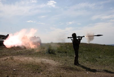A Ukrainian serviceman fires a rocket launcher during a military training exercise not far from front line in Donetsk region. AFP