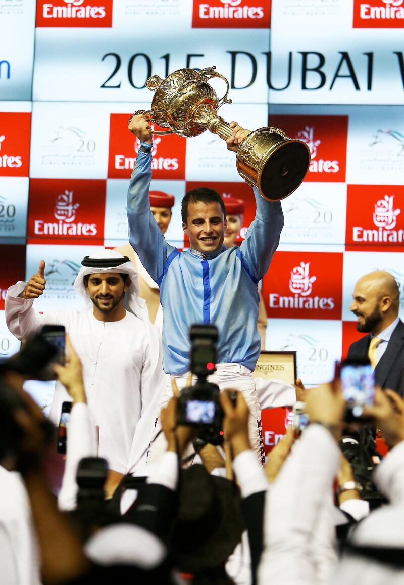 DUBAI , UNITED ARAB EMIRATES Ð Mar 28 , 2015 : Prince Bishop ( IRE  ) number 1 ridden by William Buick won the Dubai World Cup 9th horse race ( 2000m Dirt ) at the Meydan Racecourse in Dubai.  H . H . Sheikh Hamdan Bin Mohammed Bin Rashid Al Maktoum , Crown Prince of Dubai ( left ) also seen in the photo. ( Pawan Singh / The National ) For Sports. Story by Geoffrey Riddle / Amith Passela
 *** Local Caption ***  PS2803- DWC126.jpg