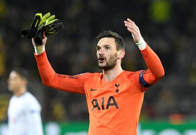 Tottenham keeper Hugo Lloris celebrates after the Champions League round of 16, 2nd leg, soccer match between Borussia Dortmund and Tottenham Hotspur at the BVB stadium in Dortmund, Germany, Tuesday, March 5, 2019.  (Bernd Thissen/dpa via AP)