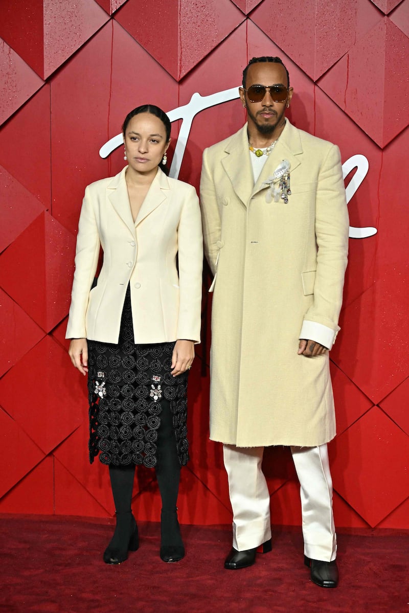 F1 driver Lewis Hamilton and fashion designer Grace Wales Bonner arrive at the 2023 Fashion Awards. AFP