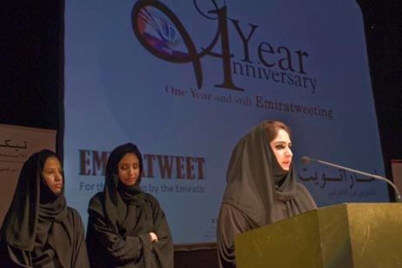 Hanan Huwair, one of the Co-Founder of Emiratweet, speaks at  the first anniversery of Emiratweet as her co-founders Heba Al Samt(L) and Ayesha Al Janahi(R) listen on Saturday, Nov. 20, 2010 in Dubai, United Arab Emirates. Photo: Charles Crowell for The National