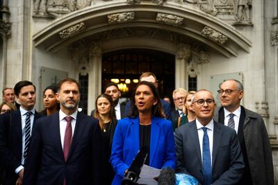 epa07865581 Anti-Brexit campaigner Gina Miller (C) speaks to media as she leaves the Supreme Court after the ruling on the prorogation of parliament, in London, Britain, 24 September 2019. The Supreme Court ruled that the suspension of parliament by British Prime Minister Boris Johnson was unlawful.  EPA/NEIL HALL