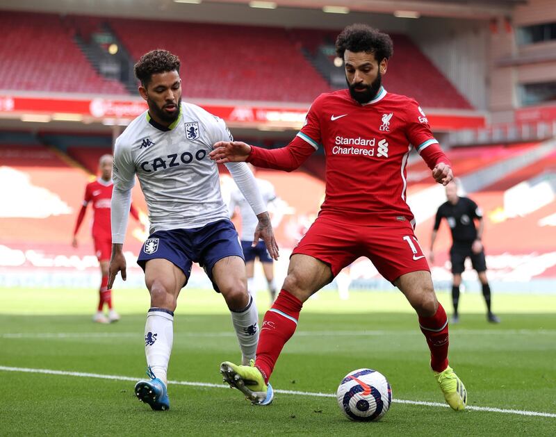 Douglas Luiz - 4: The Brazilian was pushed into a more upfield role than usual and had little influence on the game. He allowed his compatriot Fabinho too much time and space in the midfield. Getty