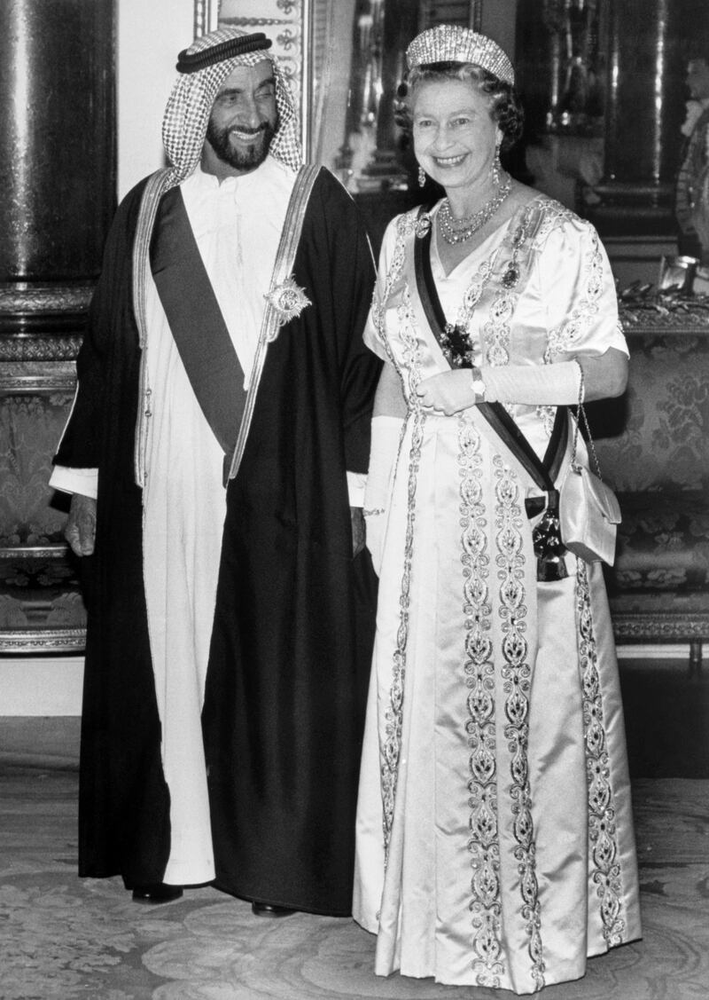 Sheikh Zayed with Queen Elizabeth in the Music Room at Buckingham Palace. Getty Images