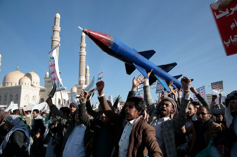 Houthi supporters attend a rally in Sanaa in support of Palestinians in the Gaza Strip and against the US-led air strikes on Yemen. AP