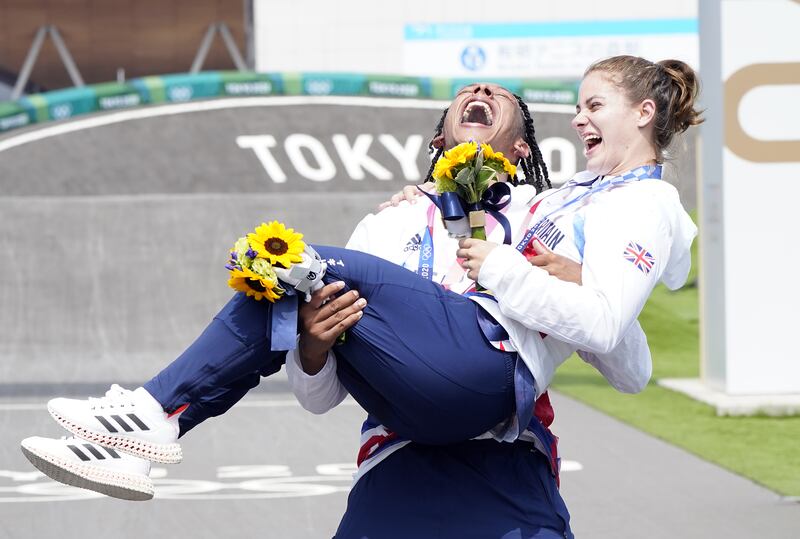 Great Britain's Bethany Shriever and Kye Whyte celebrate their gold and silver medals respectively for the Cycling BMX Racing.
