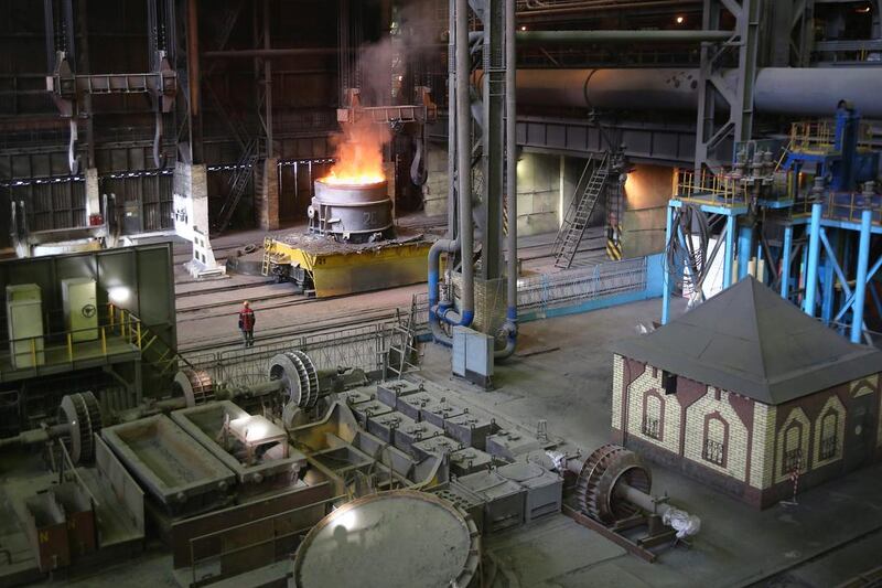 Molten steel is moved through the Metinvest Ilyich Iron and Steel Works. Rinat Akhmetov, the owner of the factory and richest man in Ukraine, has enlisted his 300,000 employees to end the turmoil unleashed by the armed takeover of pro-Russian separatists in Mairupol. John Moore / Getty Images