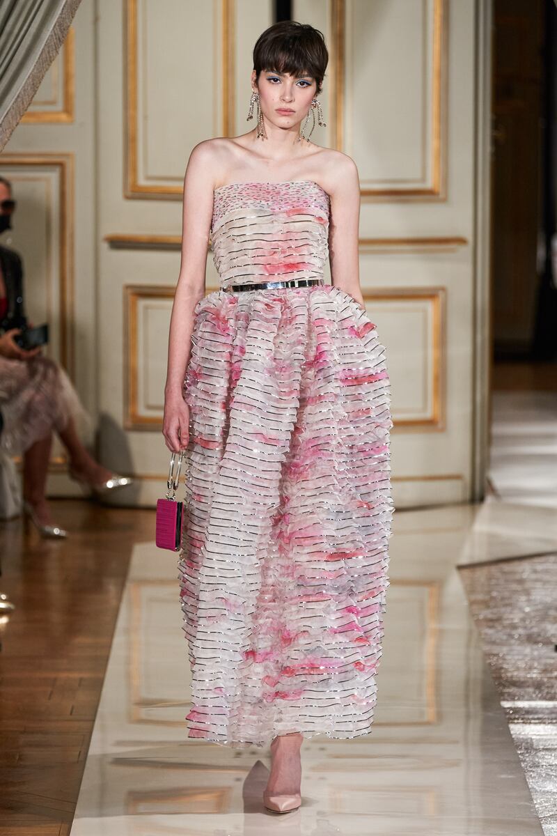 Armani Prive created dresses of tightly layered tulle, and soft, almost hand-painted flowers.