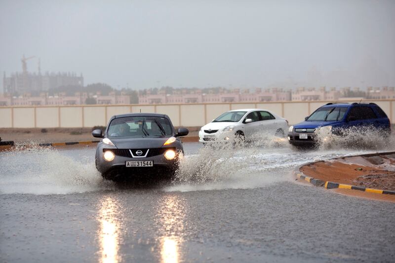 Ras al-Khaimah, United Arab Emirates, March 21, 2013:    Motorists make their way through a flooded round-about during heavy rain south of Al Harma in Ras al-Khaimah on March 21, 2013. Christopher Pike / The National
