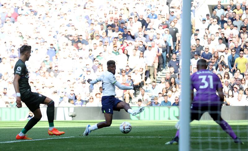 Tottenham's Emerson Royal shoots before Southampton's Mohammed Salisu scores an own goal. Action Images