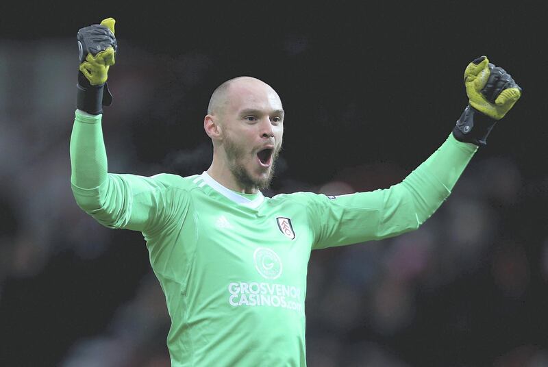 BRENTFORD, ENGLAND - DECEMBER 02: David Button of Fulham celebrates his sides opening goal during the Sky Bet Championship match between Brentford and Fulham at Griffin Park on December 2, 2017 in Brentford, England. (Photo by Harry Murphy/Getty Images)