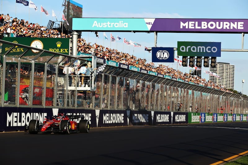 Charles Leclerc takes the chequered flag to win the Australian Grand Prix. Getty