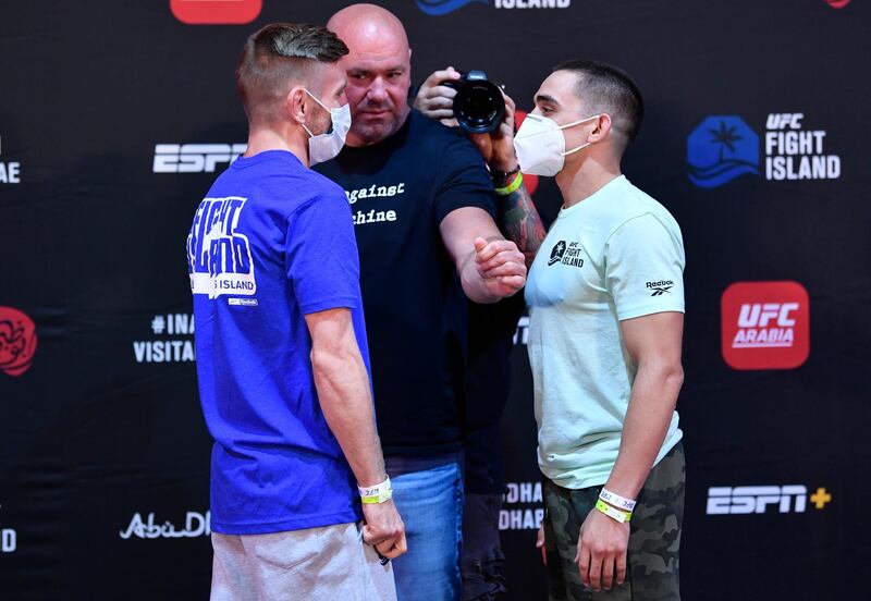 ABU DHABI, UNITED ARAB EMIRATES - JULY 14: (L-R) Opponents Tim Elliott and Ryan Benoit face off during the UFC Fight Night weigh-in inside Flash Forum on UFC Fight Island on July 14, 2020 in Yas Island, Abu Dhabi, United Arab Emirates. (Photo by Jeff Bottari/Zuffa LLC via Getty Images)