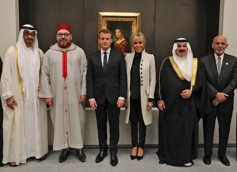 Sheikh Mohammed bin Zayed, Crown Prince of Abu Dhabi and Deputy Supreme Commander of the UAE Armed Forces with, from left, Moroccan King Mohammed VI of Morocco, French president Emmanuel Macron, his wife Brigitte Macron, Bahrain's King Hamed bin Isa Al Khalifa and Ashraf Ghani, the Afghan president.  Ludovic Marin / AFP Photo