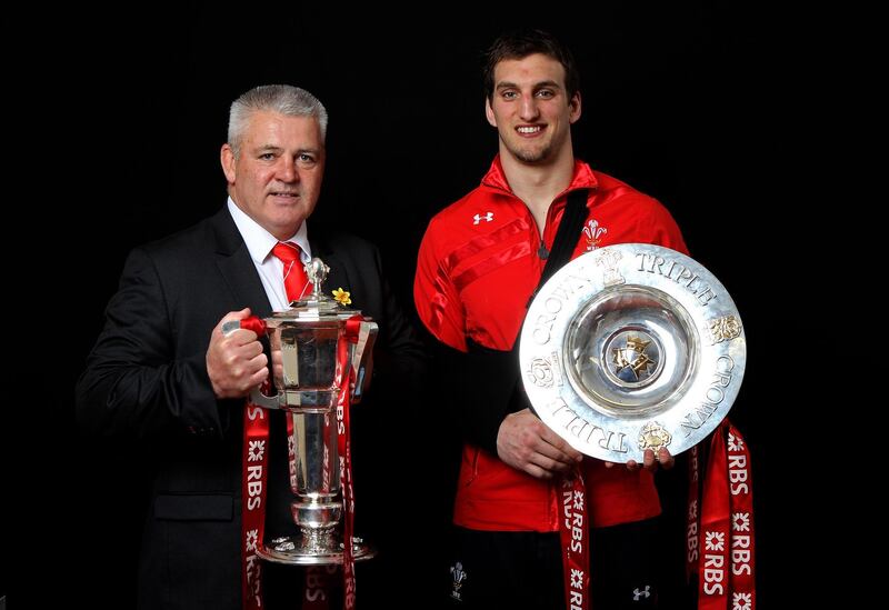 Wales coach Warren Gatland and Warburton pose with the Six Nations Trophy and the Triple Crown trophy during the RBS Six Nations Championship match between Wales and France at the Millennium Stadium in Cardiff, Wales, on March 17, 2012.  Getty Images