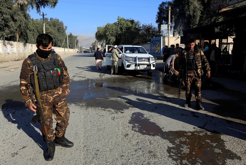 Afghan security forces inspect the site of an attack on a vehicle carrying Japanese doctor Tetsu Nakamura, in Jalalabad, Afghanistan, December 4, 2019.REUTERS/Parwiz