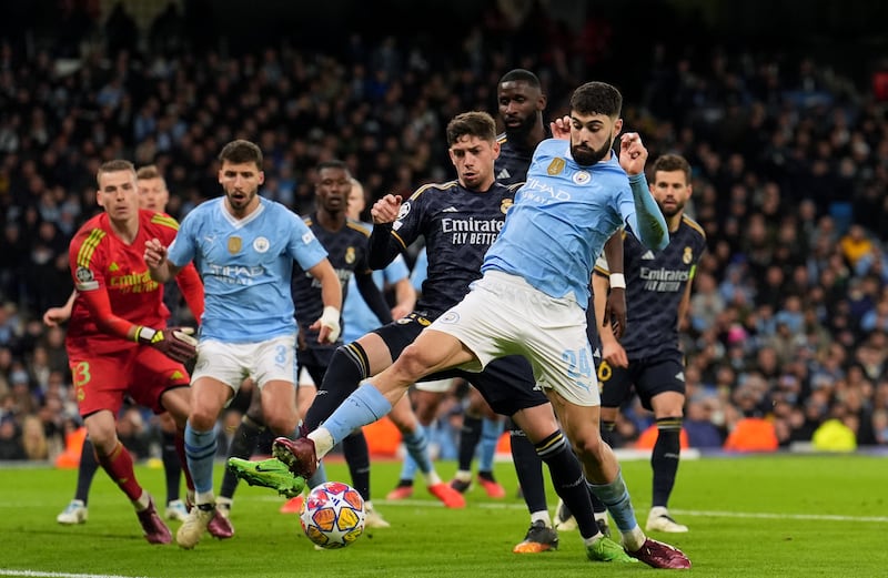Scored fine goals in successive games from left-back for City but more focused on defensive duties here which he did with aplomb. Booked for foul on Bellingham. PA