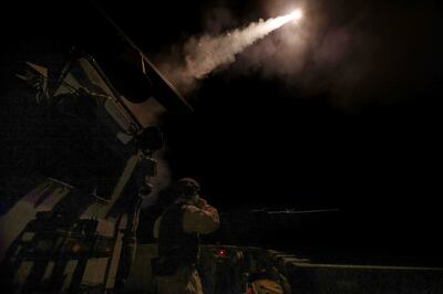 HMS Richmond fires missiles to shoot down Houthi drones heading towards the ship, on the Red Sea, in March. Reuters