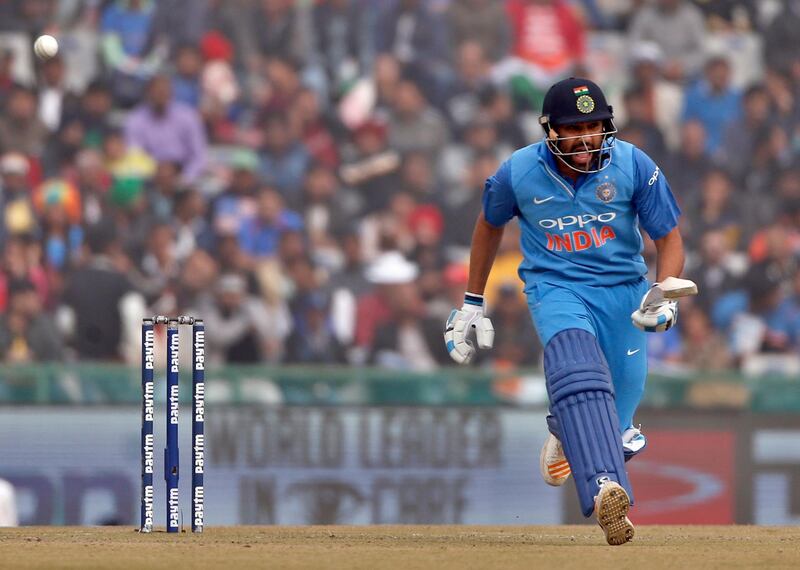 India's captain Rohit Sharma reacts after playing a shot during their second one-day international cricket match against Sri Lanka in Mohali, India, Wednesday, Dec. 13, 2017. (AP Photo/Altaf Qadri)