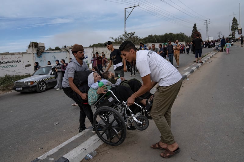 Palestinians flee to the southern Gaza Strip. AP