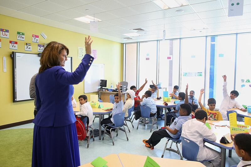 ABU DHABI, UNITED ARAB EMIRATES - - -  September 8, 2013 --- Students returned back to school at Mubarak Bin Mohamed School on Sunday.   ( DELORES JOHNSON / The National ) ***** Reporter is Kyle****** *** Local Caption ***  DJ-0809-NA-BackToSchool-009.jpg