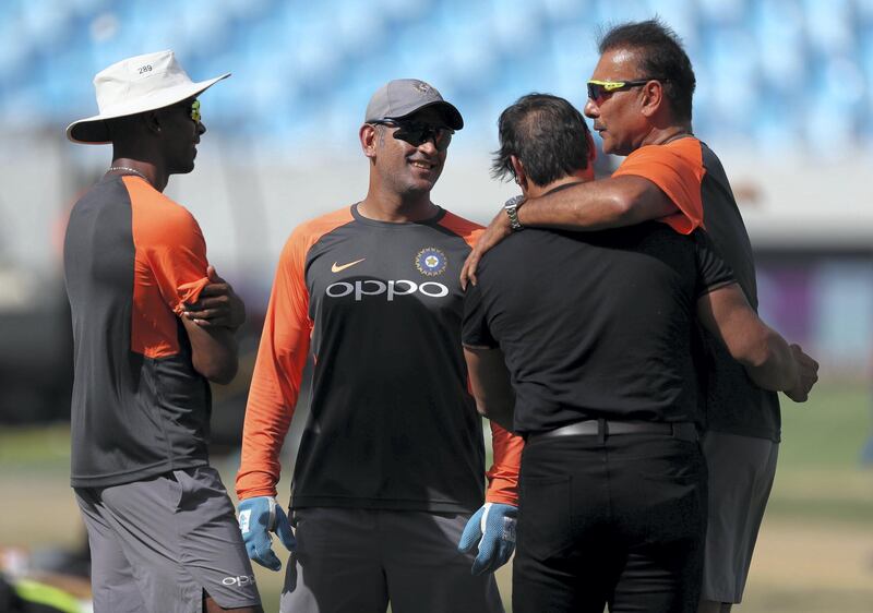 Dubai, United Arab Emirates - September 18, 2018: L-R Hardik Pandya, MS Dhoni, Shoaib Akhtar and Ravi Shastri before the game between India and Hong Kong in the Asia cup. Tuesday, September 18th, 2018 at Sports City, Dubai. Chris Whiteoak / The National