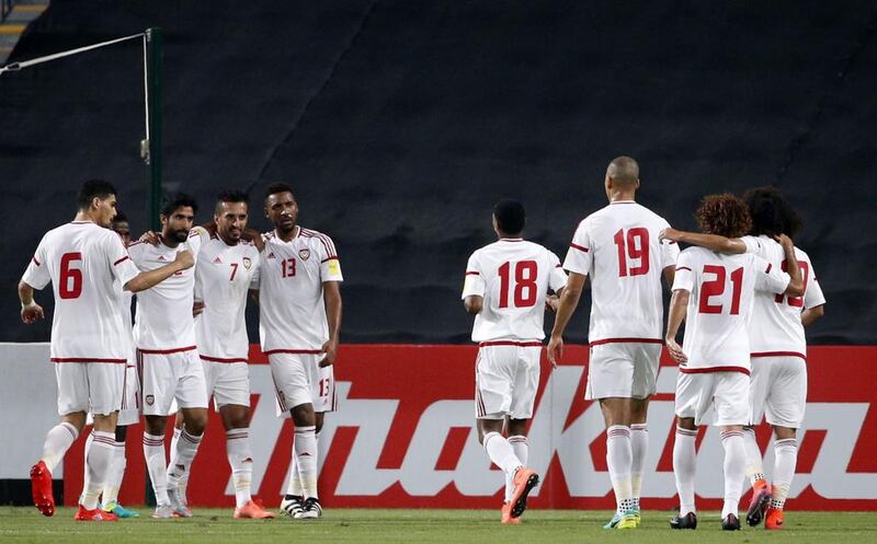 UAE players celebrate during the victory over Thailand. Karim Sahib / AFP