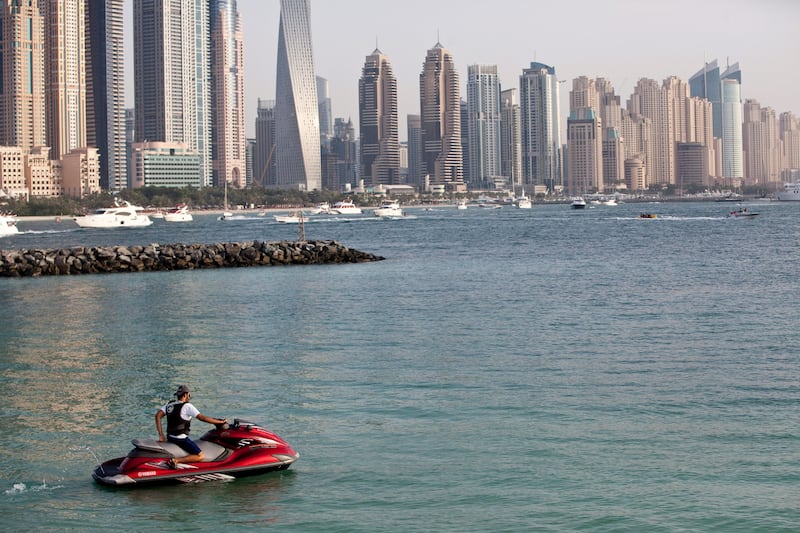 DUBAI, UNITED ARAB EMIRATES,  JUNE 06, 2013. General image of jet ski's. A rider prepares to set off from around the start of the trunk of The Palm Jumeirah. Jet Skiers are allowed to enter this area but are not allowed to enter The Palm and jet ski between the houses. Permission for photography was not obtained from the pictured people. (ANTONIE ROBERTSON / The National)