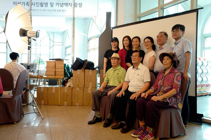 South Korean resident Lee Jae-il (85, front C) and his family, takes a family picture to give his North Korean family at Hanwha resort on Sokcho in Gangwon-do, South Korea,. Some 93 South Koreans are in a first group who will meet North Korean relatives in North Korea for three days starting from 20 to 22 August . EPA