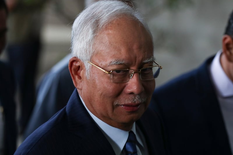 epa07224934 Former Malaysian Prime Minister Najib Razak arrives at the Kuala Lumpur High Court in Kuala Lumpur, Malaysia, 12 December 2018. Former chief executive officer of 1Malaysia Development Berhad (1MDB) Arul Kanda Kandasamy and Former Malaysian Prime Minister Najib Razak are expected to be charged at the Kuala Lumpur High Court in connection with claims that the audit report of the state investment fund was tampered with.  EPA/FAZRY ISMAIL