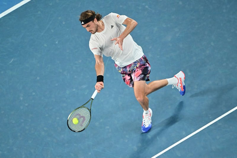 Stefanos Tsitsipas returns. AFP