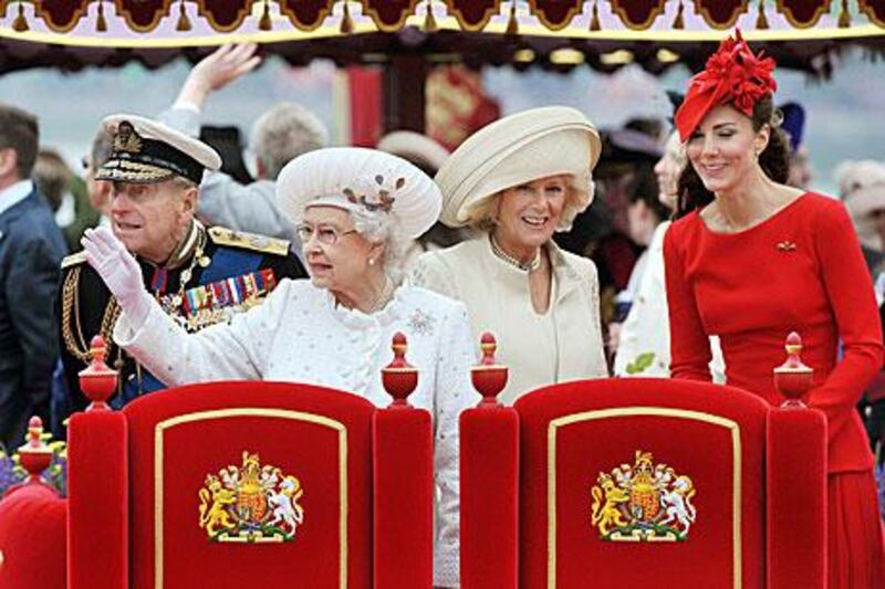 From left, Prince Philip, the Duke of Edinburgh, Queen Elizabeth II, Camilla, the Duchess of Cornwall, and Catherine, the Duchess of Cambridge onboard the Spirit of Chartwell yesterday.