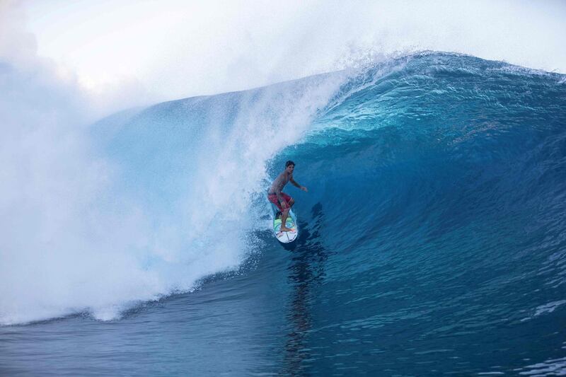 Brazilian surfer and world champion Gabriel Medina warms up before the 2019 Tahitian Teahupo'o surf trials. AFP
