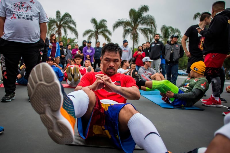 Manny Pacquiao trains in the morning with fans and friends at Pan Pacific Park in Los Angeles. AFP