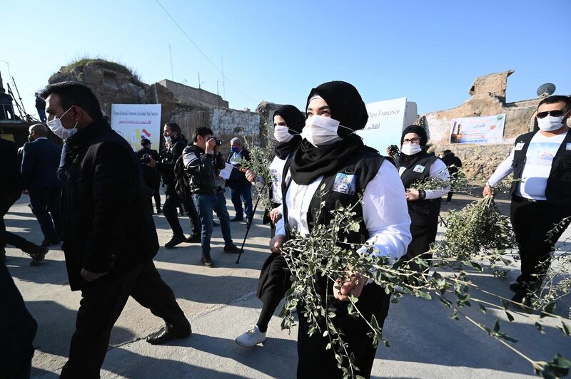 Iraqis in the northern city of Mosul get ready to welcome Pope Francis. AFP