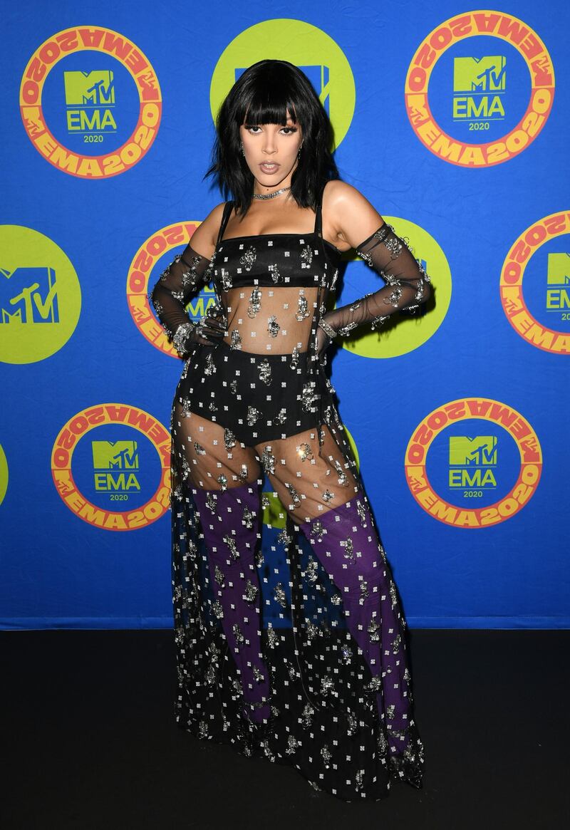 Doja Cat, in Givenchy, poses ahead of the MTV EMAs in Los Angeles, California. Getty Images