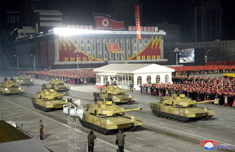 A tank unit parades during a military parade marking the ruling party congress. KCNA / AP