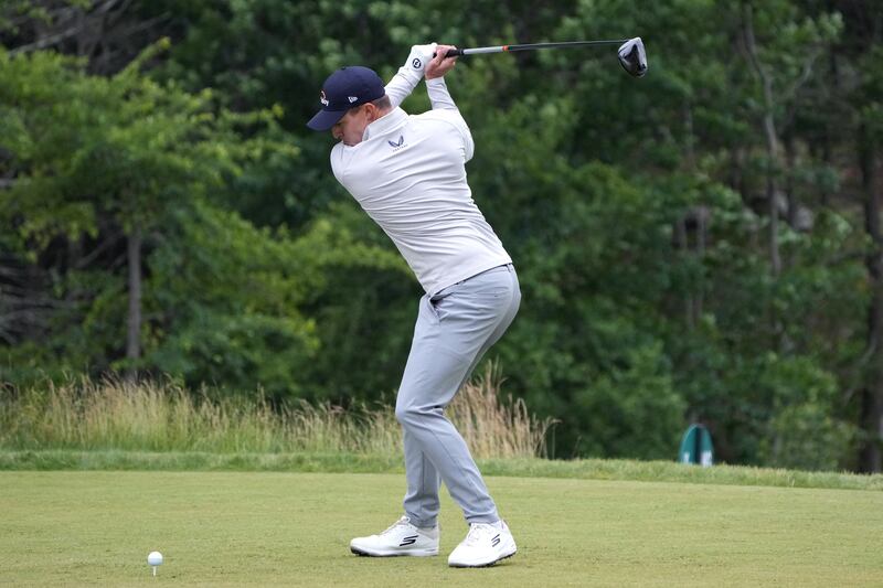 Matt Fitzpatrick plays his shot from the eighth tee. Reuters