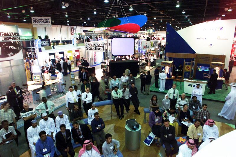 Visitors attend a Microsoft demonstration at Gitex, the computer exhibition that opened on October 2000 in Dubai. Gitex celebrated its 20th anniversary with what was described by organisers as the biggest ever Middle East technology exhibition. AFP