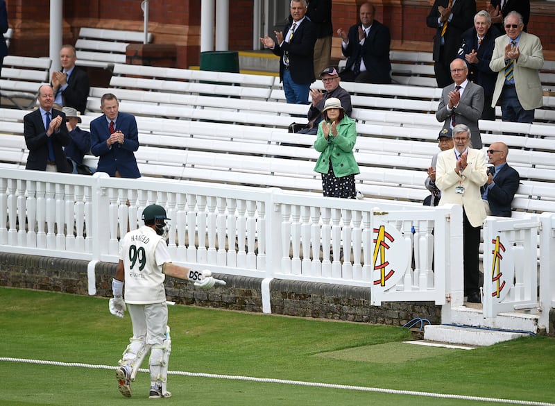 MCC members applaud as Haseeb Hameed of Nottinghamshire walks off after being dismissed during the county championship match against Middlesex at Lord's. Getty