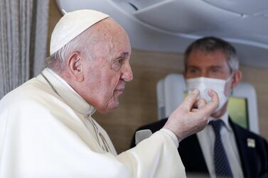 Pope Francis discusses his historic four-day tour of Iraq during the flight back to Rome on Monday. EPA