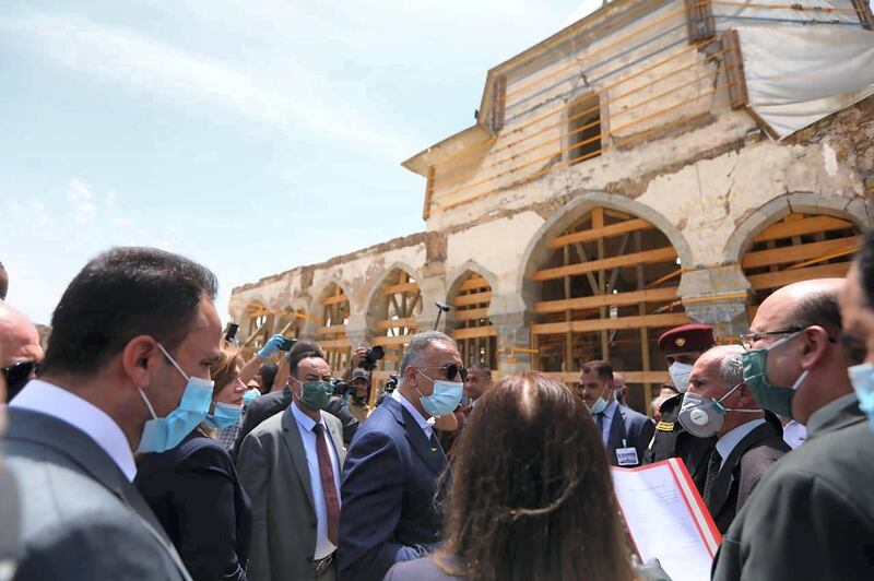 Prime Minister Mustafa Al Kadhimi tours Al Nuri Mosque, destroyed by ISIS and being rebuilt with assistance from the UAE. Iraqi PM Media Office HO