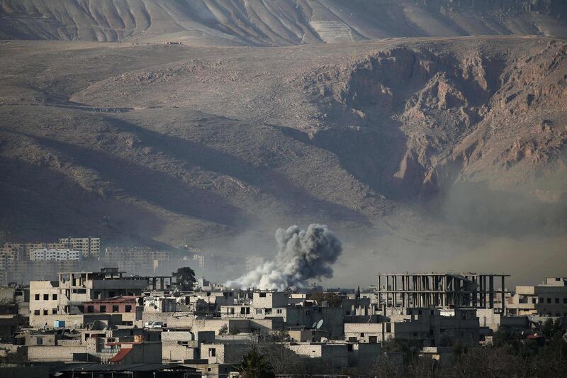 Smoke billows following Syrian government bombardments on the besieged rebel-held town of Hamouria in the eastern Ghouta region on the outskirts of the capital Damascus on March 3, 2018. Abdulmonam Eassa / AFP