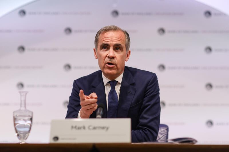 Mark Carney, governor of the Bank of England (BOE), gestures while speaking during the bank's quarterly inflation report news conference in the City of London, U.K., on Thursday, May 10, 2018. The Bank of England kept interest rates on hold after a first-quarter economic slump and forecast that inflation will slow to its target faster than previously anticipated. Photographer: Simon Dawson/Bloomberg