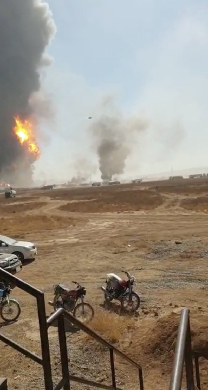 Debris fly after an explosion in Herat, Afghanistan. Reuters