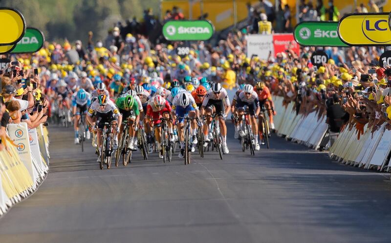 Ireland's Sam Bennett, far left in white,  on his way to victory in a sprint finish. AP